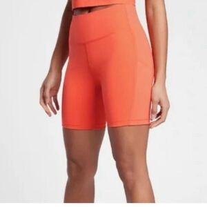 Athleta Ultimate Stash Pocket 7" Short I Orange Haze women's S